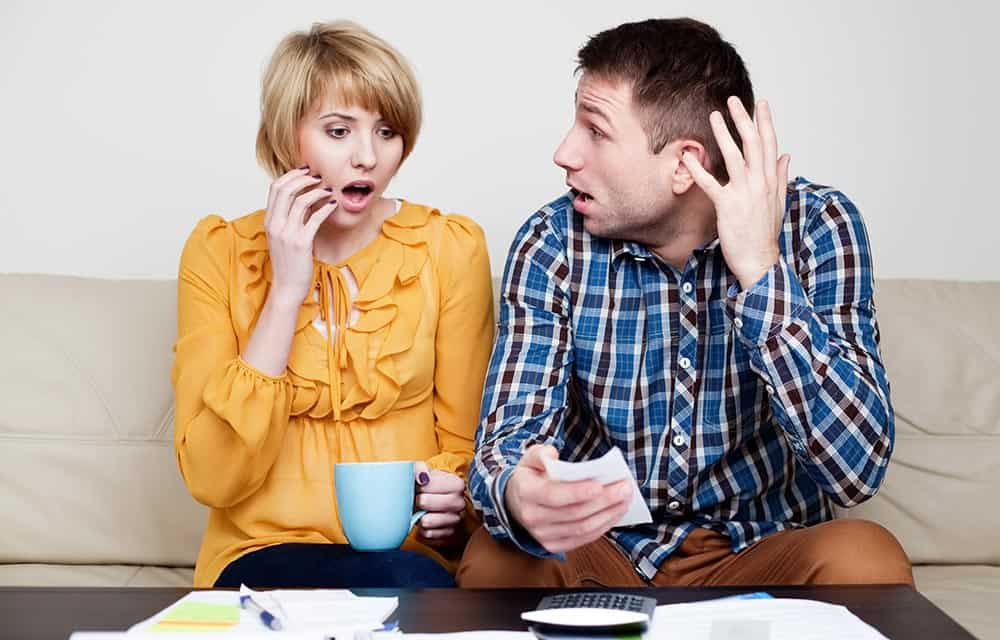 A Couple Checking Their Expenses