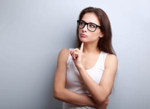 Serious thinking young woman