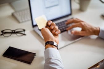 Man using credit card for online shopping