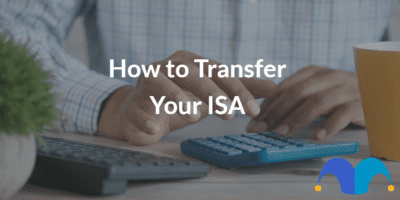 Man working on calculator with the text “how to transfer your ISA” and The Motley Fool jester cap logo