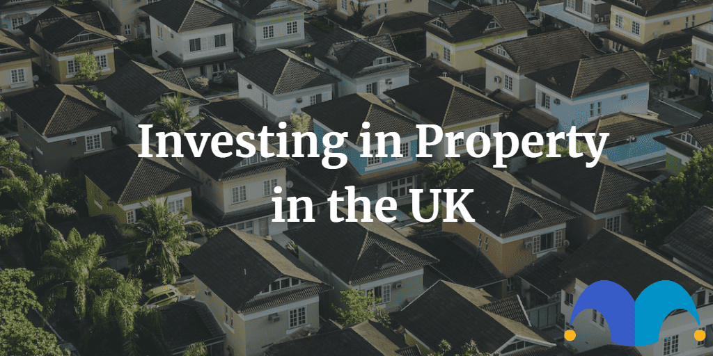 Neighborhood over shot with the text “Investing in Property in the UK” and The Motley Fool jester cap logo